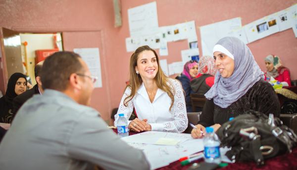 Her Majesty Queen Rania attends a workshop for teachers at Khawla Bint Al Azwar Secondary School for Girls in Amman on Tuesday (Photo courtesy of Royal Court)